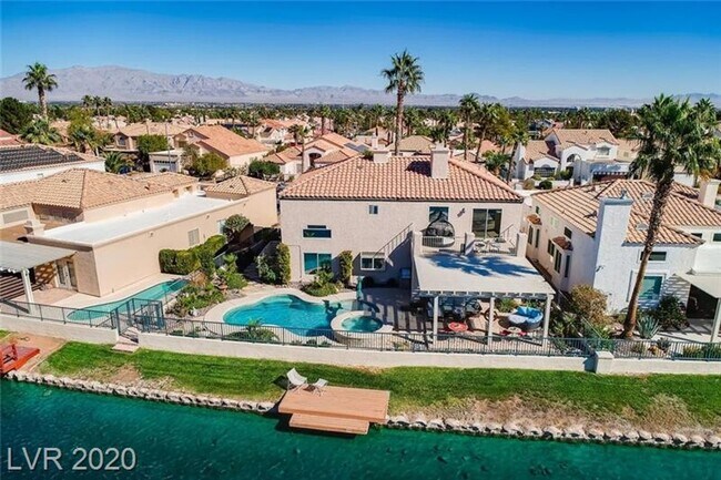 Building Photo - Vegas's Only Available Waterfront Rental ~ 4 Bedroom Desert Shores Lake Front Home