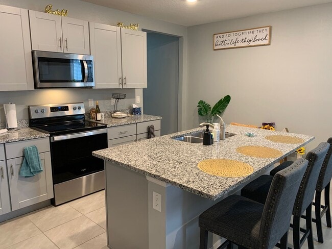 Building Photo - ALMOST NEW 3/2 HOME close to everything!!  BEAUTIFUL WITH LOTS OF UPGRADES!