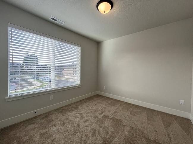 Building Photo - Modern 2025-Built 4 Bedroom Home with EV Charging, 5kW Solar, Open-Concept Living, Scenic Outdoor...