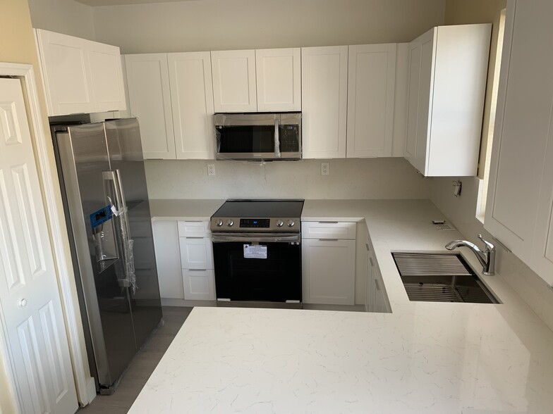 Brand new never used kitchen cabinets and appliances. - 13801 SW 275th Ter