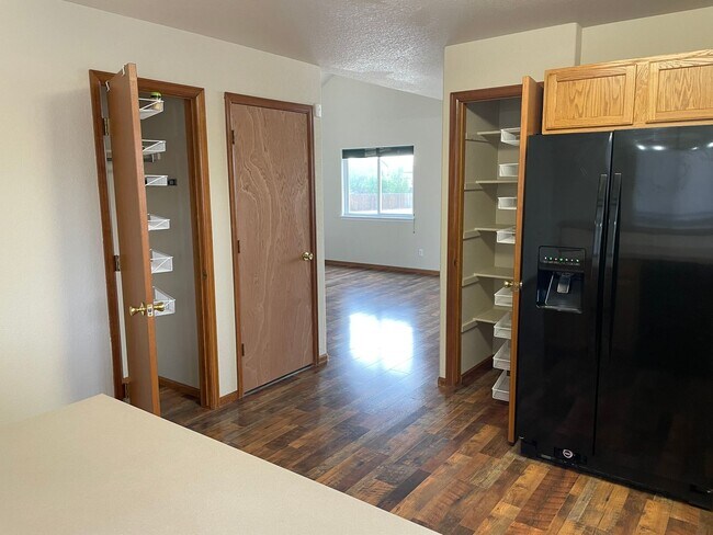 Building Photo - Beautiful 3 Bed 2.5 Bath Home in Milliken, Huge Corner Lot, Fenced Yard & Unfinished Basement