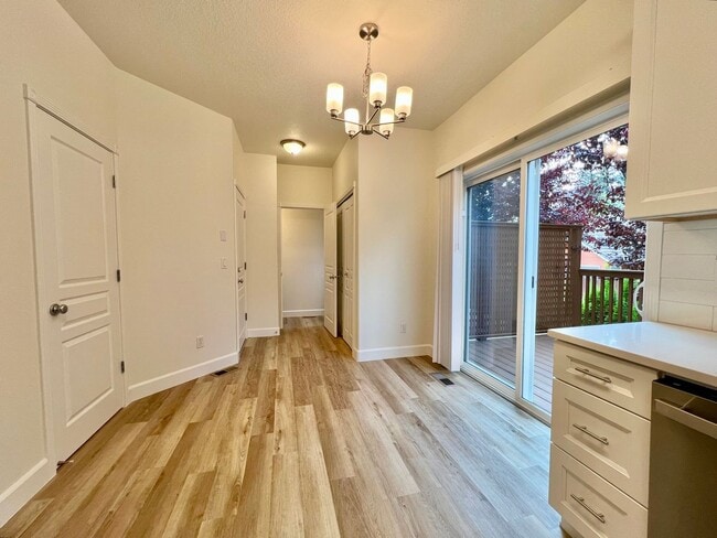 Building Photo - NEWLY RENOVATED! Spacious 2-Bedroom Townhome in a Charming Cul-de-Sac!