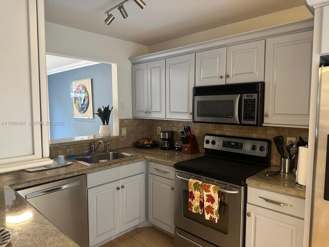 Building Photo - 9805 Costa Del Sol Blvd