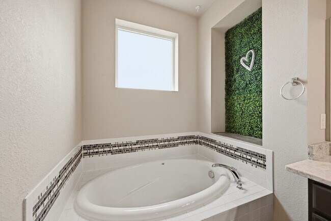 Building Photo - $2,695.45 3-bed, 2.5-bath townhome with a washer and dryer.