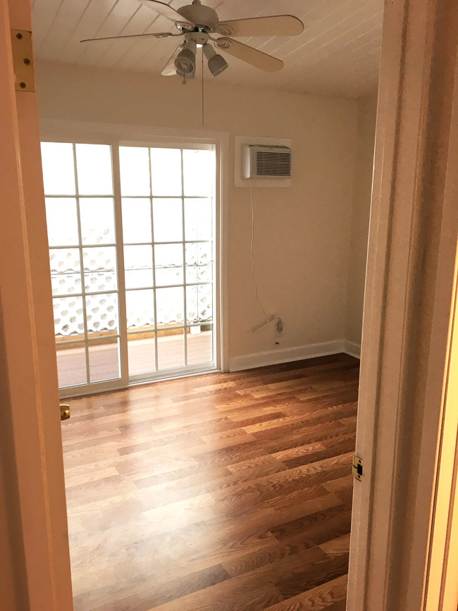 Bedroom w/ Patio Door - 419 Hill St