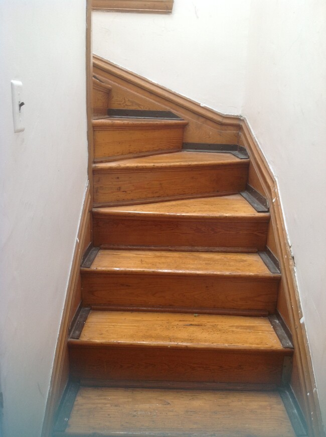 Stairs under Skylight - 4124 W Pine Blvd