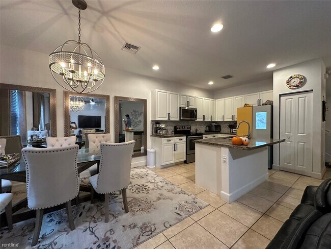 Building Photo - 4 br, 3 bath House - 4879 NW 55th Pl