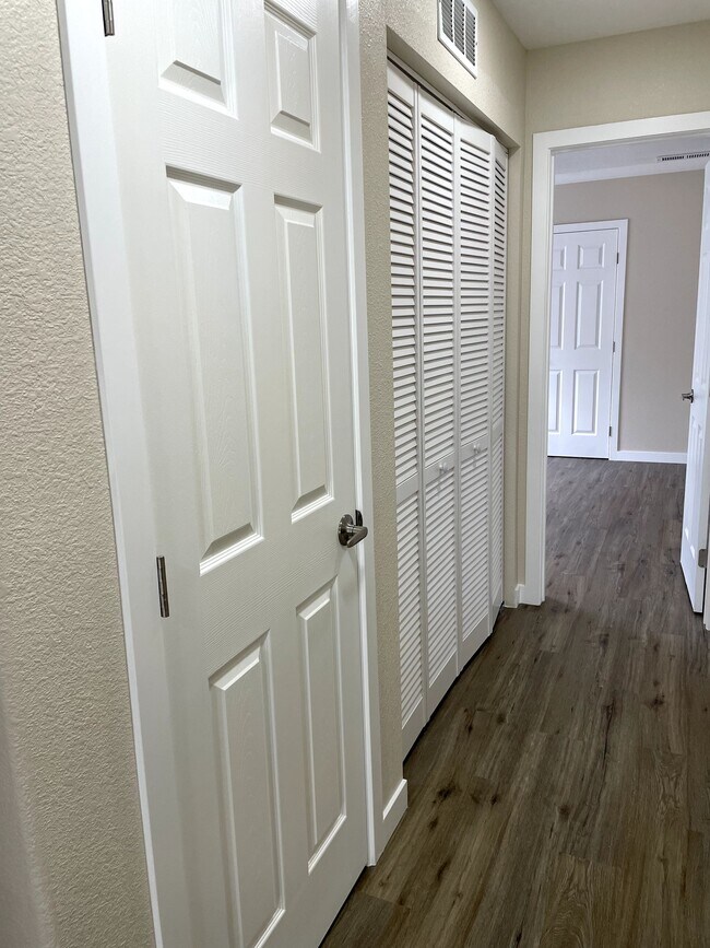 coat/storage closet and laundry space - 12838 Arezzo Cir