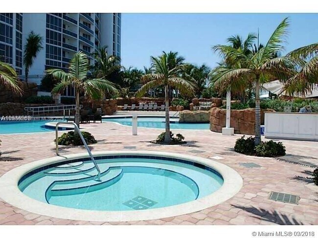 Building Photo - 18201 Collins Ave