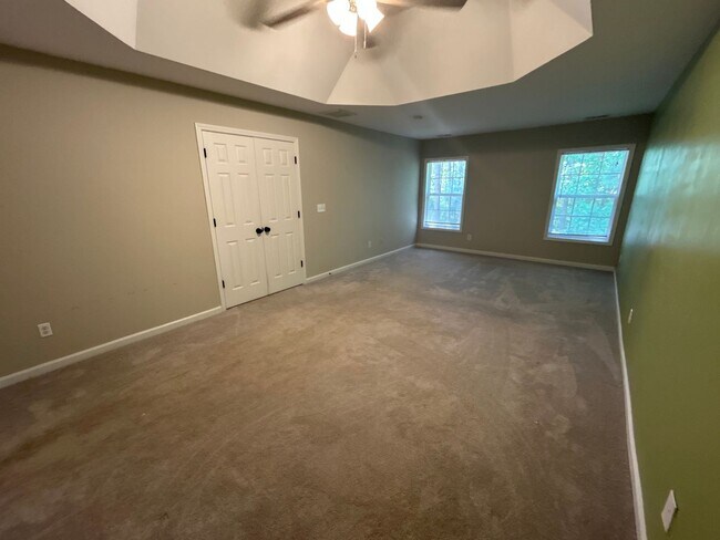 Building Photo - 4 Bedroom | 3 Bathroom Apex Home with Fenc...