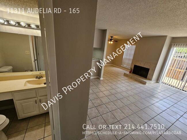 Building Photo - 2 story condo, cov parking, patio, full wa...