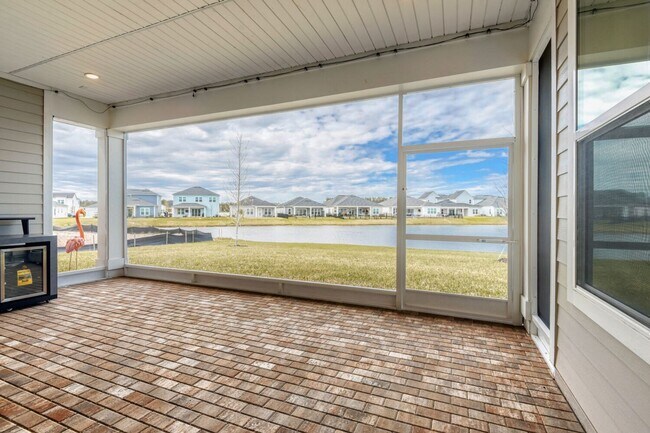 Building Photo - Resort-Style Furnished Lakefront Living in SilverLeaf | 100” Theater & Golf Cart Included