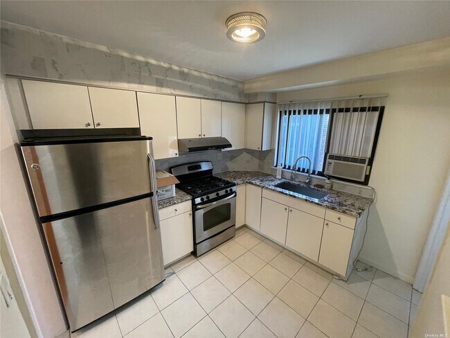 Building Photo - 217-32 50th Ave