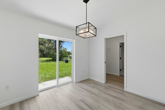 Building Photo - Available Now! New 3/2 Home with Large Backyard and Front Porch