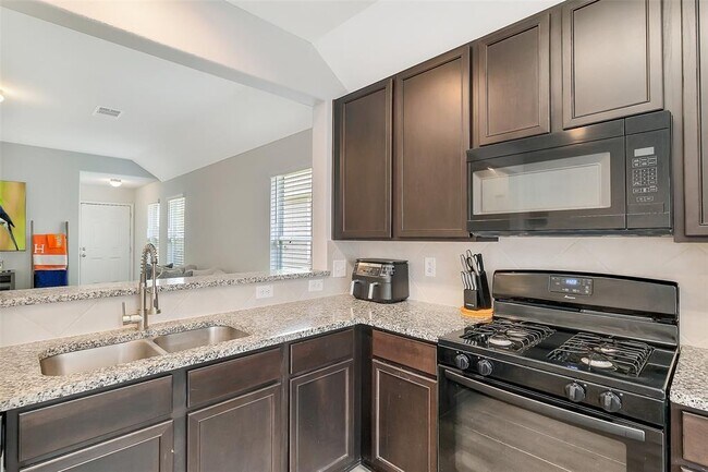 Building Photo - 23607 Buttress Root Dr