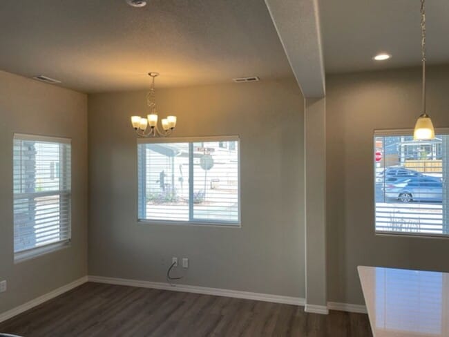 Building Photo - LIKE NEW 3BD TOWNHOME w/2.5 CAR GARAGE and A/C in NE COL SPGS - Deposit Waiver Available