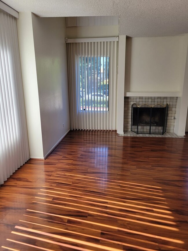 Building Photo - Plenty of Natural Light! Spacious Townhouse conveniently across Dominguez Hills!