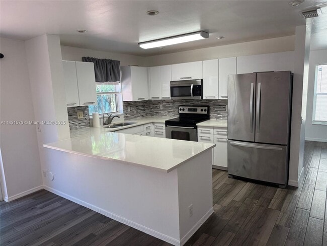 Building Photo - 7317 Flores Way
