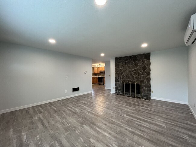 Building Photo - Single-Level 3-Bedroom Home with 2-Car Garage, Mini-Split AC, & Backyard Garden Space
