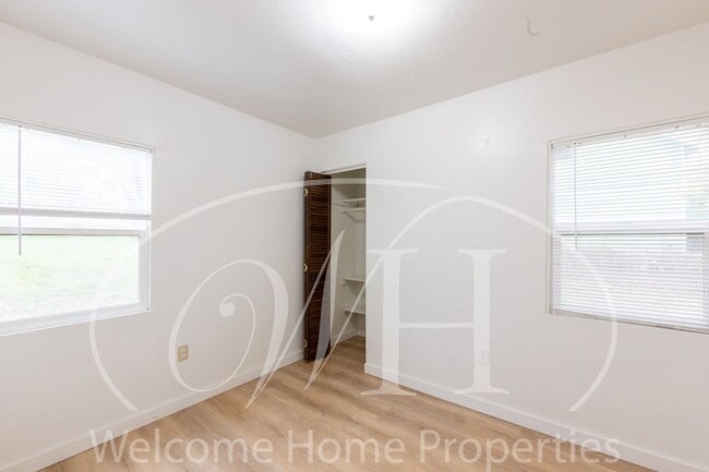 Building Photo - Comfortable 3-Bedroom Home with Fenced Yard and Attached Carport