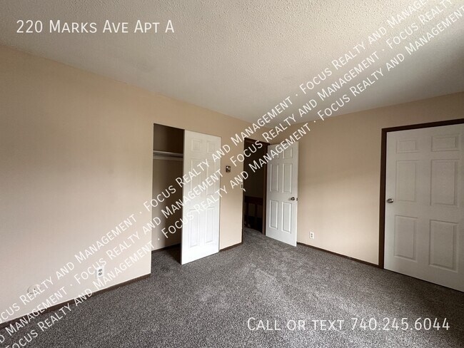 Building Photo - 220 Marks Ave