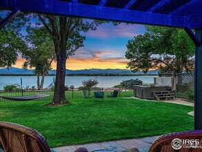 Building Photo - "Spacious 4-Bedroom Waterfront Haven with ...