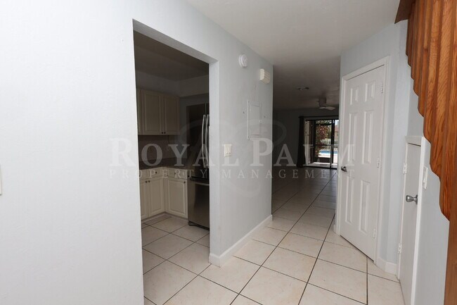 Building Photo - 2 Bed, 2.5 Bath Townhouse with Balcony, Pool & Prime Bonita Springs Location