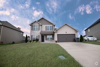 Building Photo - Pet Friendly Four Bedroom with Bonus!