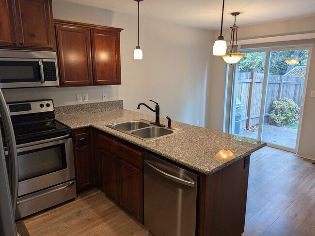 Building Photo - 407-409 Madrona Ave SE