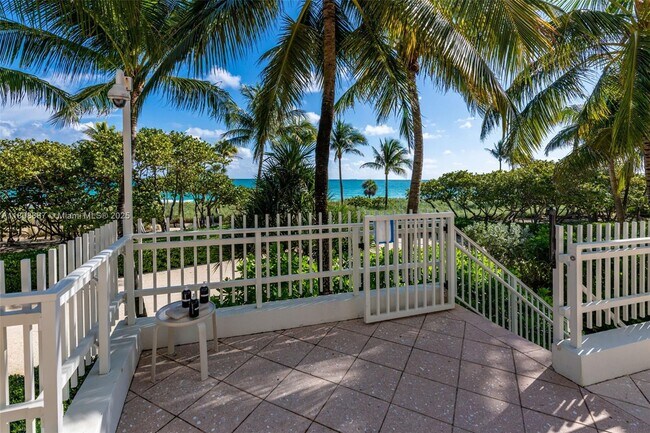 Building Photo - 10205 Collins Ave