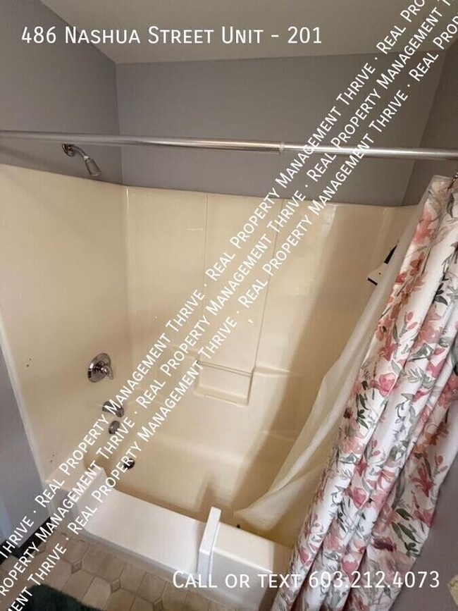 Building Photo - 486 Nashua St