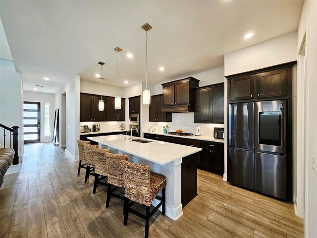 Building Photo - 15822 Pilot Knob Dr