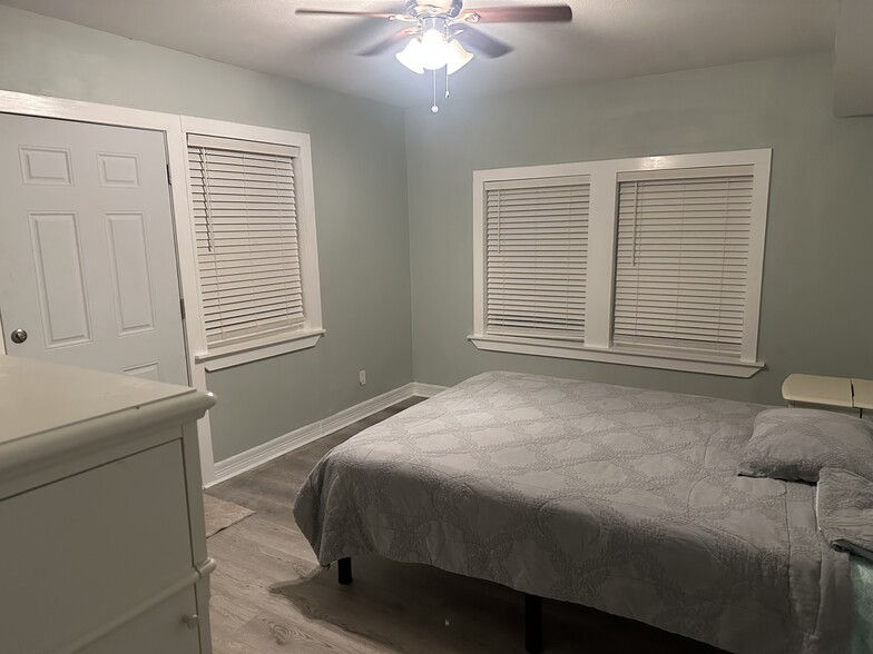 Multiple windows in Master Bedroom with Outdoor living out the back door - 2312 53rd St