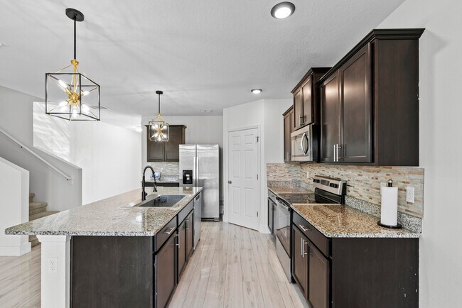 Building Photo - 6455 NW Castlebrook Ave