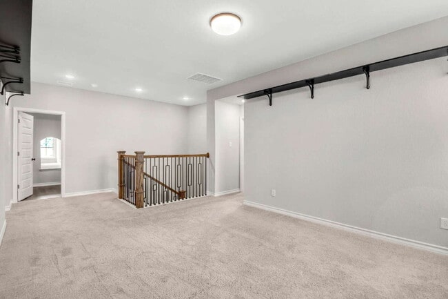 Building Photo - "Spacious 4-Bedroom Sanctuary with Cozy Fireplace in San Antonio's Prime Location!"