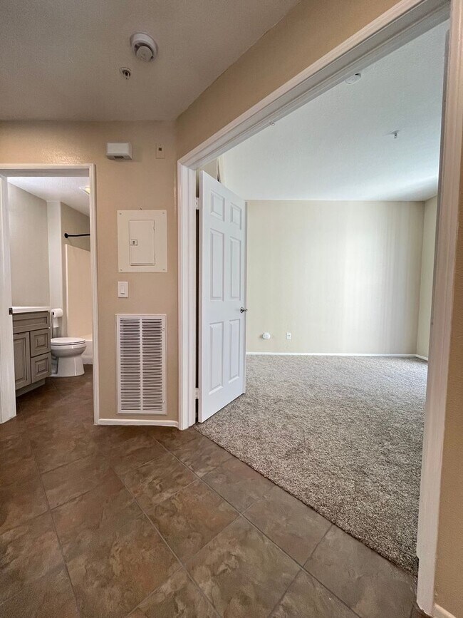 Building Photo - PICTURE PERFECT!  3 BR/3 BA END UNIT CONDO with DIRECT ACCESS 2 CAR GARAGE