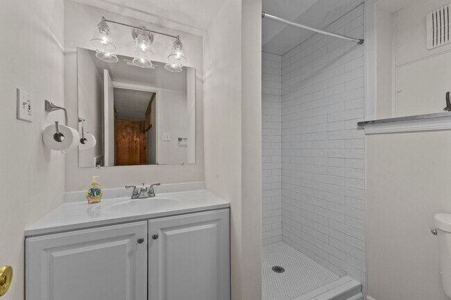 Building Photo - Discover this beautifully updated Colonial...