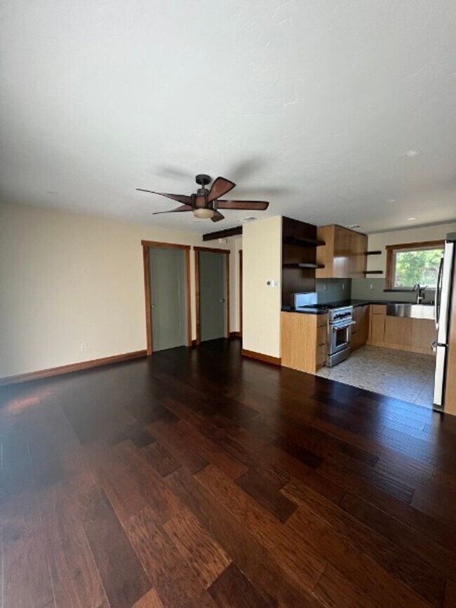 Building Photo - Artisan-Built Custom Cottage Retreat | Private Yard, Garage & EV Charging Ready