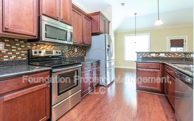 Building Photo - 5505 Riverstone Dr