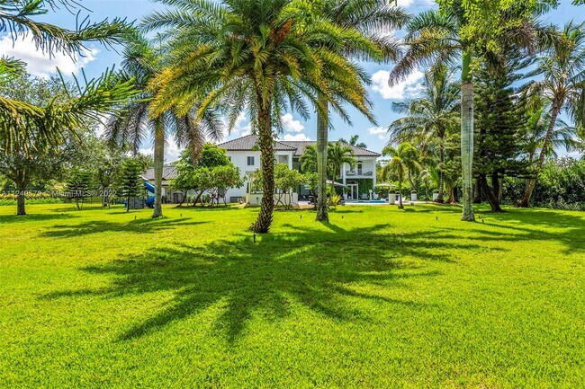 Building Photo - 5801 Melaleuca Rd