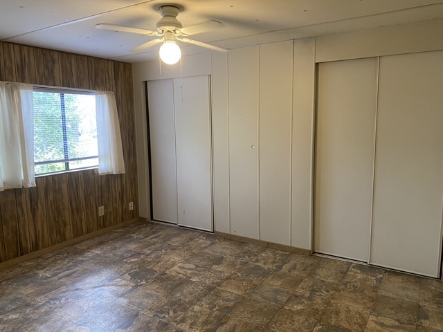 Second bedroom (10'X14'), with large closets across entire wall - 16550 County Road 282