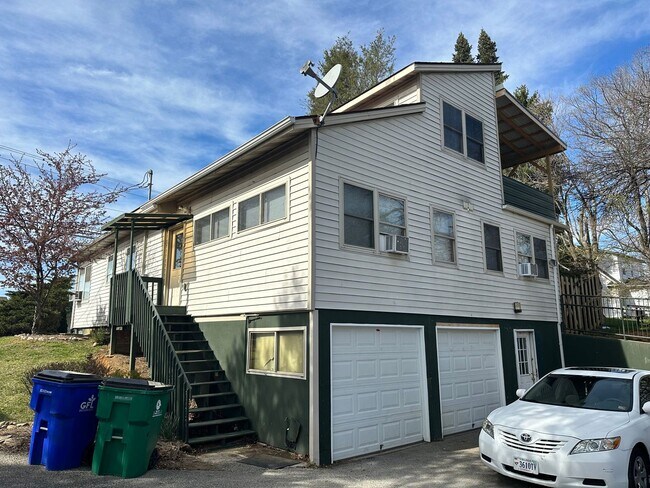Primary Photo - Unique 4 Bedroom with 2 Car Garage and out...