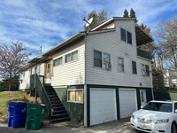 Building Photo - Unique 4 Bedroom with 2 Car Garage and out...