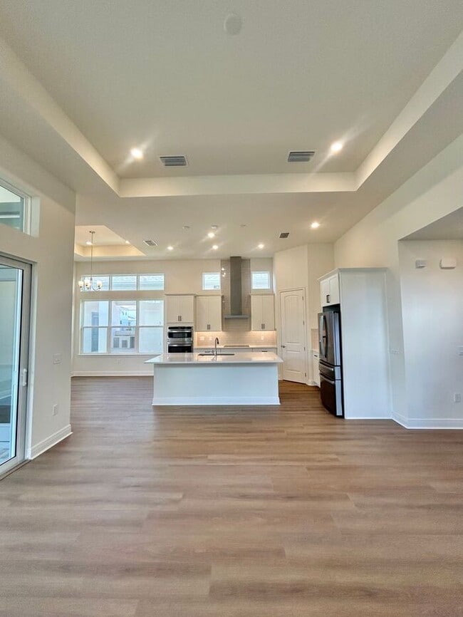 Building Photo - Gorgeous 4/3 Residence with a Private Back Lanai and a 3 Car Garage in the Delightful Laureate Pa...