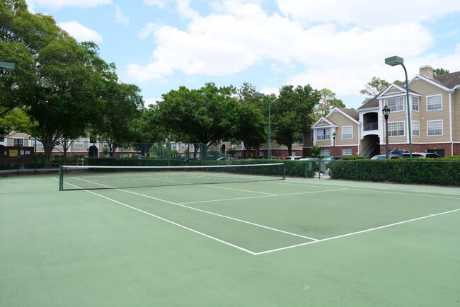 Building Photo - Upgraded Condo in Gated Community of Plant...
