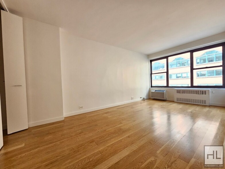 Building Photo - 1-Bedroom Apartment by Union Square | 5th Floor, Full-Service Building
