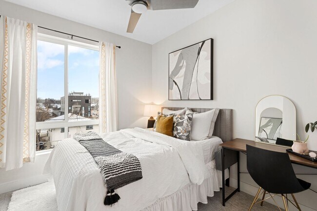 Building Photo - Modern 2-Bedroom Rowhome with Rooftop Moun...