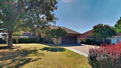 Building Photo - Welcome home to breathtaking views in this...