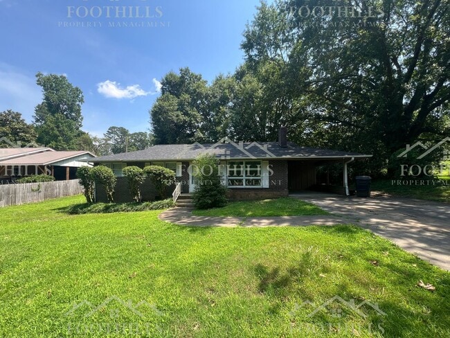 Primary Photo - 3 Bedroom Home with Fenced Yard & Carport ...