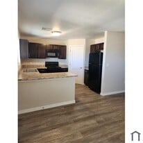 Building Photo - 1910 Travis Rd